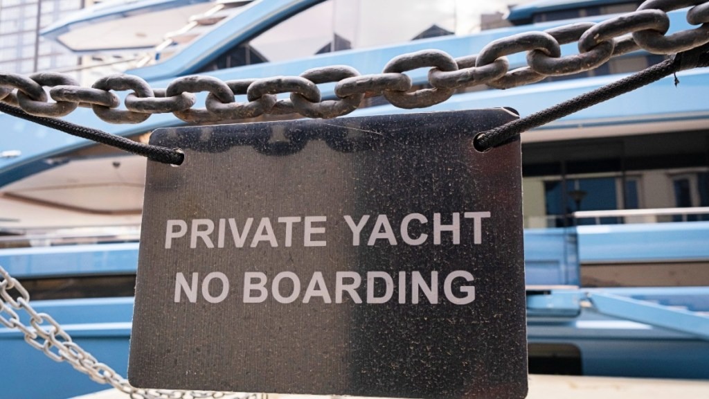 Chains and keep out signs on seized yachts