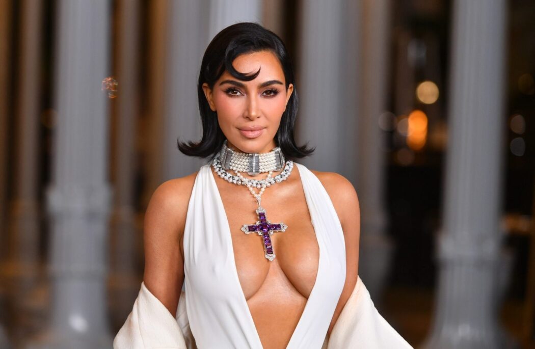 Kim Kardashian Wearing Princess Dianas Amethyst Cross Necklace