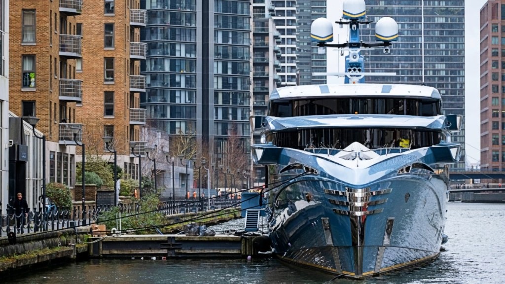 Superyacht Phi is being held at a dock on the River Thames